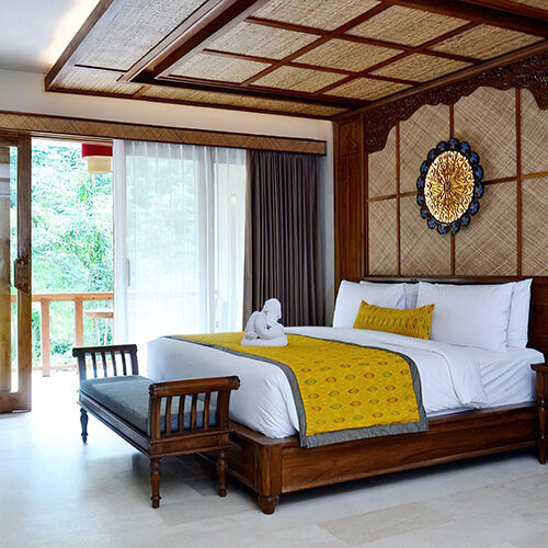 Comfortable room at RYK Yoga retreat – Serene accommodations for relaxation and rejuvenation.